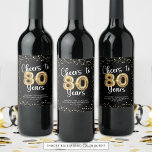 Cheers to 80 Years Black Gold Confetti Birthday Wine Label<br><div class="desc">Cheers to 80 Years Black Gold Confetti Birthday Wine or Beverage Labels. Celebrate an 80th birthday with these personalised, custom colour wine or beverage labels as a gift or party favours. These labels feature a CHEERS TO 80 YEARS design with faux metallic gold balloon numbers and confetti and modern script...</div>