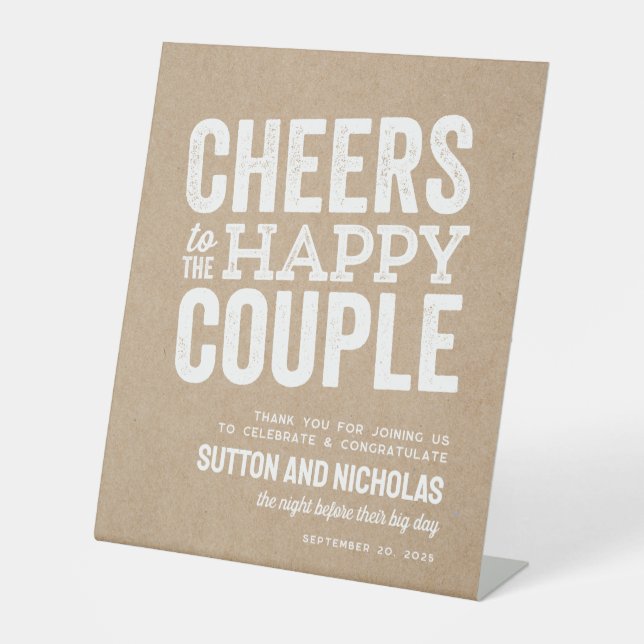 Cheers to the happy couple kraft rehearsal dinner pedestal sign (Front)