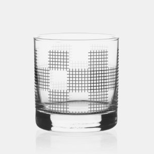 Chequered patches pattern black and white whiskey glass