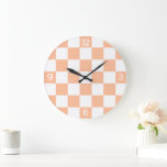 Chequered squares peach and white geometric retro large clock<br><div class="desc">Chequered squares peach orange white geometric retro pattern. Cool retro chequered geometric square pattern. Vintage tile white and peach light orange modern chequered.</div>