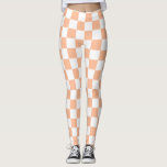 Chequered squares peach and white geometric retro leggings<br><div class="desc">Chequered squares peach orange white geometric retro pattern. Cool retro chequered geometric square pattern. Vintage tile white and peach light orange modern chequered.</div>