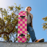 Chequered squares peach hot pink geometric retro skateboard<br><div class="desc">Chequered squares peach hot pink geometric retro skateboard. Outdoor Sports Equipment gift for her skateboarder girl. Cool retro chequered geometric square pattern. Vintage tile peach hot pink modern chequered.</div>