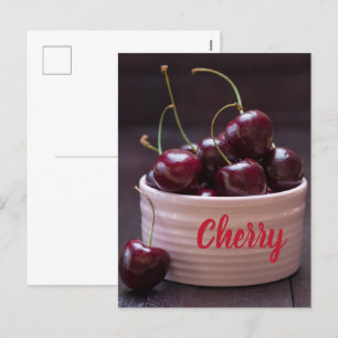 Cherries in pink bowl for fruit lover holiday postcard
