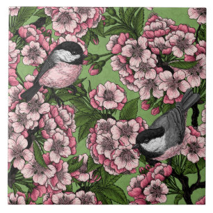 Cherry blossom and chickadees on green ceramic tile