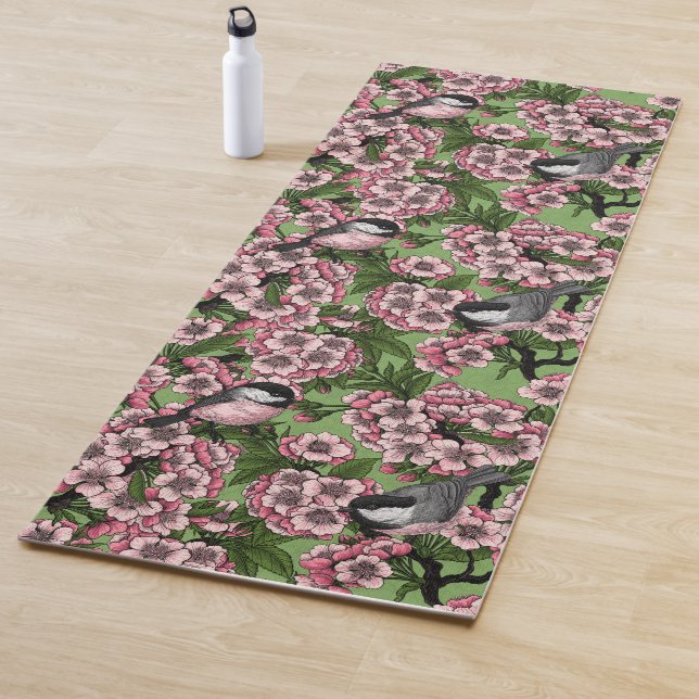 Cherry blossom and chickadees on green yoga mat (In Situ)