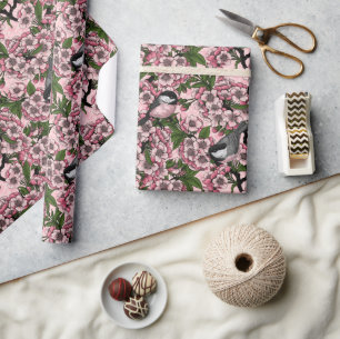 Cherry blossom and chickadees on pink wrapping paper