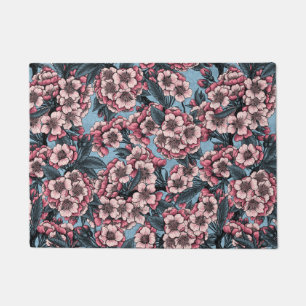 Cherry blossom in pink and blue doormat