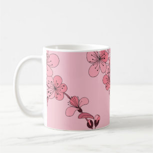 Cherry blossom in pink colour on white background. coffee mug