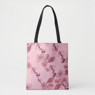 Cherry blossom in pink colour on white background. tote bag