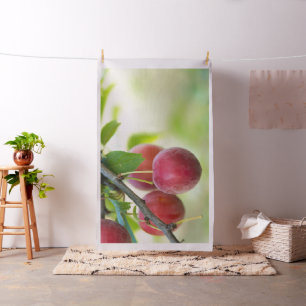 Cherry plum on branch fabric