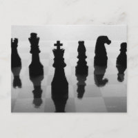 Chess pieces on chess board in black and white