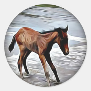 Chestnut Foal Playing in the Ocean round sticker