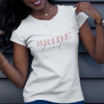 Chic Dusty Pink Bold Script Calligraphy Bride Name T-Shirt<br><div class="desc">Celebrate your bachelorette with this elegant,  minimalist t-shirt,  featuring bold dusty pink typography and elegant calligraphy name. Easily add your own details by clicking on the "personalise" option.</div>