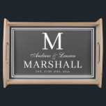 Chic Grey Newlywed Couple Monogram Name Wedding Serving Tray<br><div class="desc">Modern minimalist personalised dark grey and white serving tray with the couples first names in a calligraphy script,  last name monogram,  full last name,  and wedding date available in customisable templates.  A stylish,  elegant newlywed gift for the bride and groom with a custom personal touch.</div>
