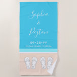 Chic Modern Beach Wedding Honeymoon Anniversary Beach Towel<br><div class="desc">The bride and groom will love personalised beach towels as a keepsake gift for a seaside wedding. All text is simple to customise. Pastel coral and light turquoise blue design features bright white typography, names, initials, wedding date, location, and monogrammed flip flops on an abstract modern minimalist beach. The handwritten...</div>