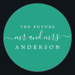 Chic Script Future Mr Mrs Emerald Green Wedding Classic Round Sticker<br><div class="desc">Chic, modern and simple wedding envelope seal with the text the future Mr and Mrs in white elegant handwritten script calligraphy and stylish typography on an emerald green background. Simply add your future married surname. Exclusively designed for you by Happy Dolphin Studio. If you need any help or matching products...</div>