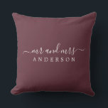 Chic Script Mr Mrs Burgundy Newlywed Monogram Cushion<br><div class="desc">Chic, modern monogrammed pillow with the text Mr and Mrs in white elegant script on a burgundy background. Simply add your married name. Perfect gift for the newlywed couple. Exclusively designed for you by Happy Dolphin Studio. If you need any help or matching products please contact us at happydolphinstudio@outlook.com. We're...</div>