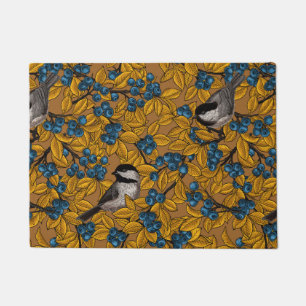 Chickadee birds on blueberry branches doormat