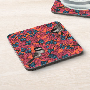 Chickadee birds on blueberry branches on orange coaster