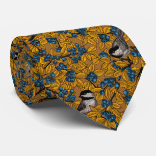 Chickadee birds on blueberry branches tie