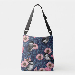 Chickadees in the wild rose in pink and blue crossbody bag