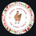 Chicken Christmas Red & Green Watercolor Classic Round Sticker<br><div class="desc">Illustration of a chicken wearing a Santa hat surrounded by "Merry Christmas" with family name arched text and holly berries over white circle with red border.  Background is red and green watercolor inspired pattern.</div>