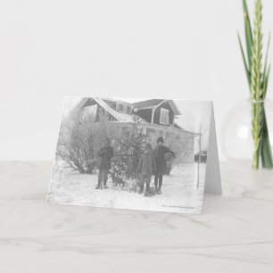 Children outside with Christmas tree Holiday Card