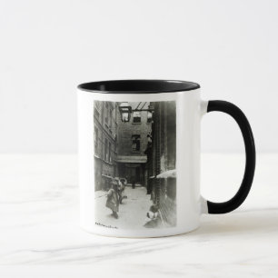 Children playing in a slum, 1899 mug