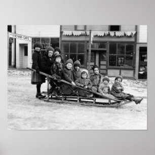 Children Playing on Sleigh in Seward Poster