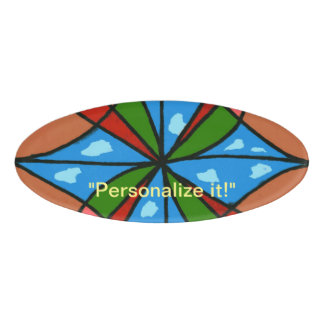 Child's windmill with red and green blades name tag