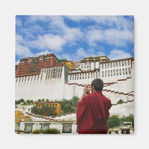 China, Tibet, Lhasa, Tibetan monk with Potala Magnet