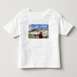 China, Tibet, Lhasa, Tibetan monk with Potala Toddler T-Shirt