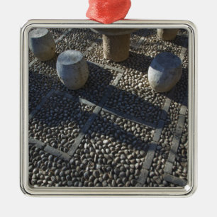 CHINA, Yunnan Province, Lijiang. Old Town, Stone Metal Tree Decoration