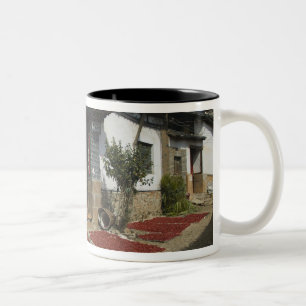CHINA, Yunnan Province, Tianshengying. Drying Two-Tone Coffee Mug