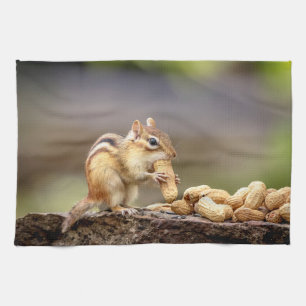 Chipmunk eating a peanut tea towel