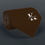 Chocolate Brown Elegant Monogram   Name Tie<br><div class="desc">An elegant necktie featuring a bold white monogram across a rich Chocolate Brown background. On top of this monogram sits your first or last name spelled out in all capitals. If you prefer a bolder look for the personal name inside of the large letter you can do the following: Use...</div>