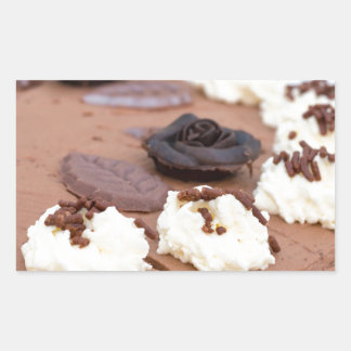 Chocolate cream cake with cake lace in detail rectangular sticker