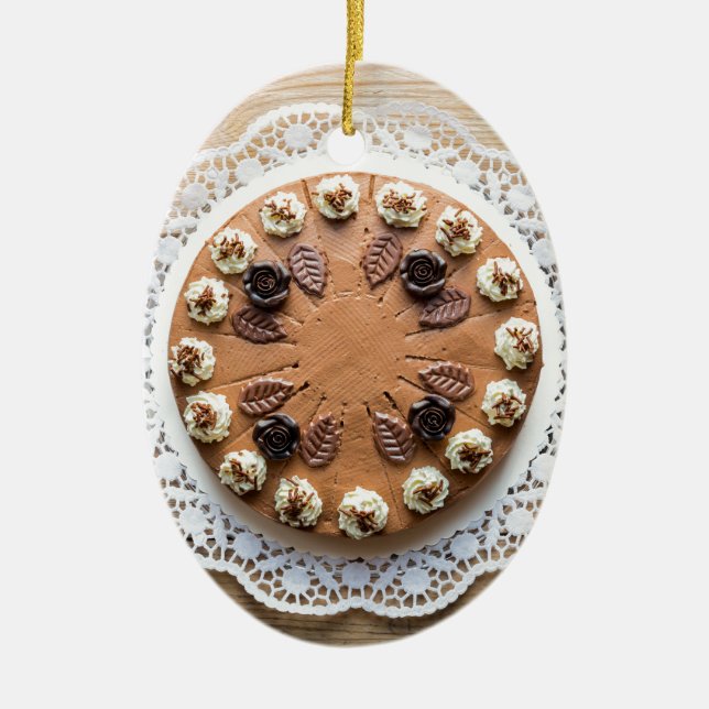 Chocolate cream pie on rustic wood cake top ceramic tree decoration (Front)