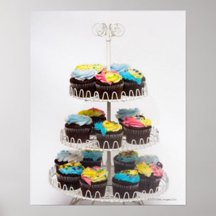 Chocolate cupcakes on a cake stand poster