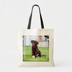 Chocolate Labrador Puppy With Tennis Ball Tote Bag