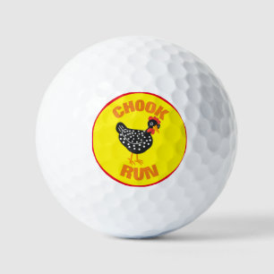 Chook run yellow background golf balls