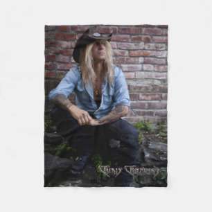 Chris Caffery Sitting by Brick Wall Fleece Blanket