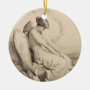 Christian angel sitting on a stone ceramic ornament