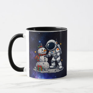 Christmas Astronaut Building a Moon Snowman Mug