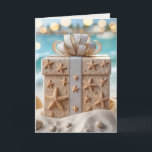 Christmas Beach Gift With Starfish Card<br><div class="desc">A beautifully wrapped Christmas gift box adorned with starfish and seashell decorations sits on a sandy beach,  with a turquoise ocean and blurred lights in the background</div>