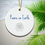 Christmas Beach Sand Dollar Peace on Earth    Ceramic Ornament<br><div class="desc">Tropical Beach Peace on Earth Holiday ceramic ornament,  with a sand dollar and blue typography design. The back has a blue color to add contrast. With customizable lettering,  you can add your own text. A simple way to decorate your Christmas tree.</div>