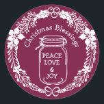 Christmas Blessings Peace Love Joy Mason Jar Classic Round Sticker<br><div class="desc">Rustic country Christmas Blessings sticker features a mason jar labelled with Peace, Love and joy. Christmas Blessings is curved around the top of the mason jar. The entire design is framed with a modern holly wreath. All of the text and graphics are white. They look wonderful against a deep burgundy...</div>