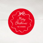 Christmas Bow | Wavy Red and White Classic Round Sticker<br><div class="desc">These adorable holiday stickers feature a trendy,  white wavy frame with a whimsical retro ribbon bow,  on a festive red background. Modern script says "Merry Christmas."</div>