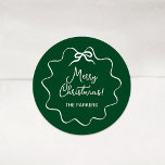 Christmas Bow | Wavy Whimsical Green and White Classic Round Sticker<br><div class="desc">These adorable holiday stickers feature a trendy,  white wavy frame with a whimsical retro ribbon bow,  on a festive green background. Modern script says "Merry Christmas."</div>