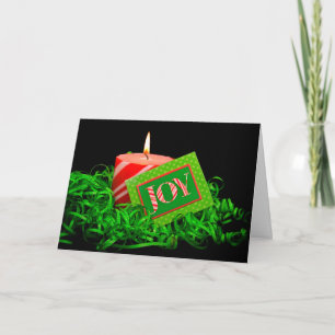 Christmas candle with joy card